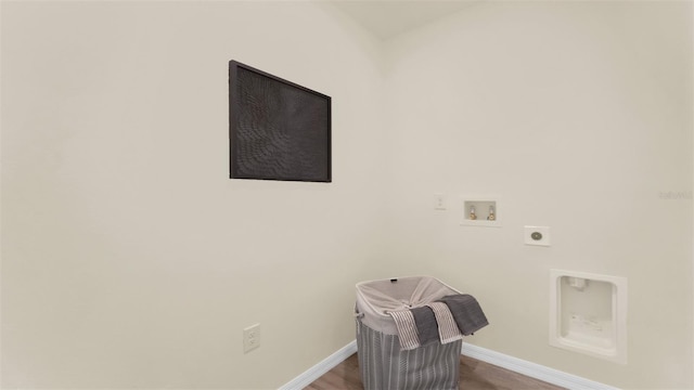 5650 Paddock Fence Ln, Apopka, FL 32712 - washroom with electric dryer hookup, hookup for a washing machine, and wood finished floors