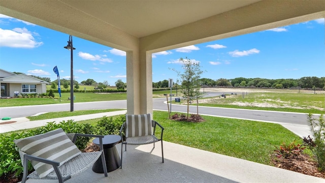 5650 Paddock Fence Ln, Apopka, FL 32712 - covered porch with a yard