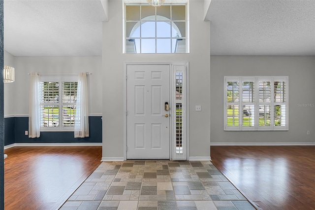 1326 Hampshire Place Cir, Altamonte Springs, FL 32714 - entryway with a textured ceiling and wood finished floors