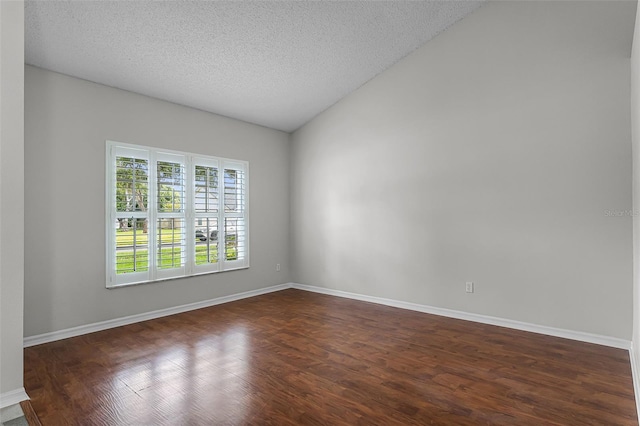 1326 Hampshire Place Cir, Altamonte Springs, FL 32714 - spare room featuring vaulted ceiling, dark wood-style floors, and a textured ceiling
