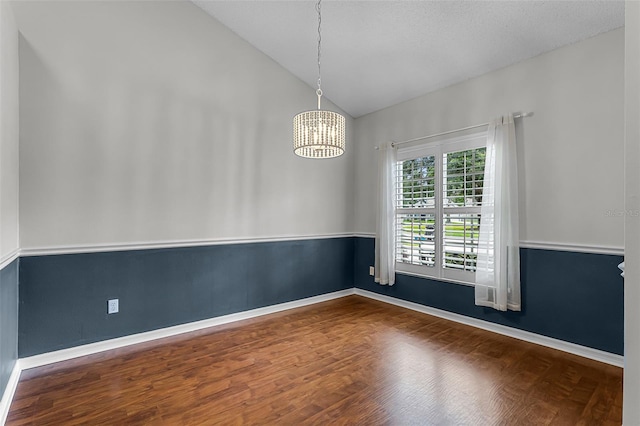 1326 Hampshire Place Cir, Altamonte Springs, FL 32714 - empty room featuring lofted ceiling, wood finished floors, and a chandelier
