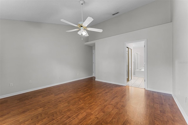 1326 Hampshire Place Cir, Altamonte Springs, FL 32714 - unfurnished room featuring ceiling fan, wood finished floors, and vaulted ceiling