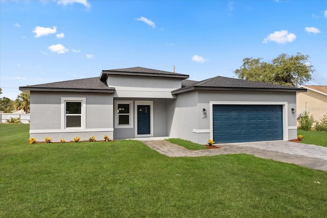 1970 SW 160th Pl, Ocala, FL 34473 - prairie-style house featuring stucco siding, an attached garage, a front lawn, and driveway