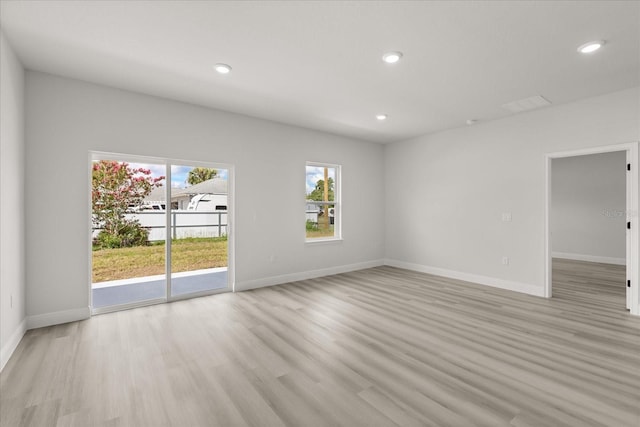 1970 SW 160th Pl, Ocala, FL 34473 - spare room featuring light wood finished floors and recessed lighting