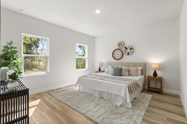 1970 SW 160th Pl, Ocala, FL 34473 - bedroom featuring light wood-type flooring and recessed lighting