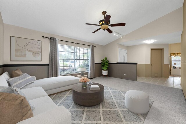 9001 New Orleans Ct, Orlando, FL 32818 - carpeted living room featuring lofted ceiling, ceiling fan, and track lighting