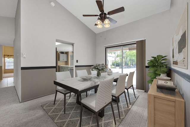 9001 New Orleans Ct, Orlando, FL 32818 - dining room with high vaulted ceiling, ceiling fan, and light colored carpet