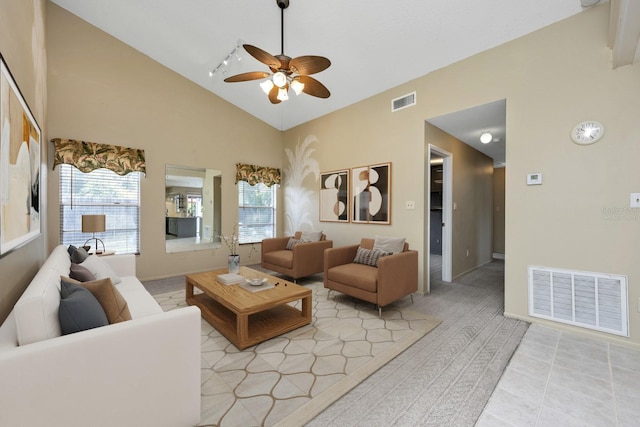 9001 New Orleans Ct, Orlando, FL 32818 - living room featuring ceiling fan, high vaulted ceiling, and light tile patterned flooring