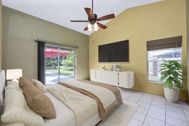 9001 New Orleans Ct, Orlando, FL 32818 - bedroom featuring access to outside, vaulted ceiling, multiple windows, light tile patterned floors, and ceiling fan