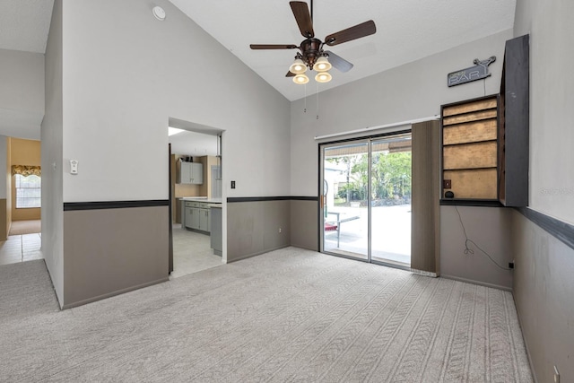 9001 New Orleans Ct, Orlando, FL 32818 - spare room with light carpet, a ceiling fan, and high vaulted ceiling