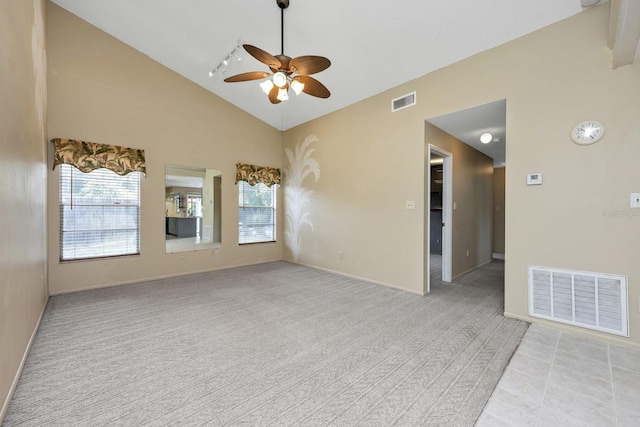 9001 New Orleans Ct, Orlando, FL 32818 - spare room featuring ceiling fan, light colored carpet, and high vaulted ceiling