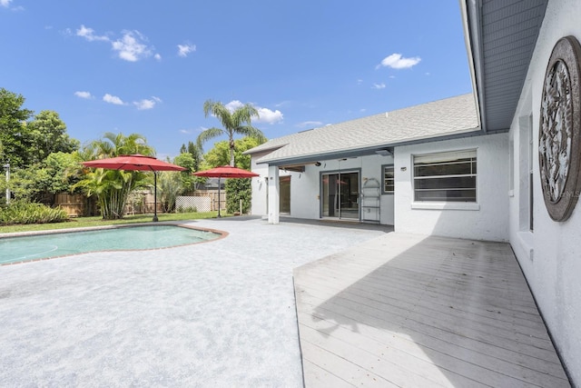 9001 New Orleans Ct, Orlando, FL 32818 - view of swimming pool featuring a deck and a patio area