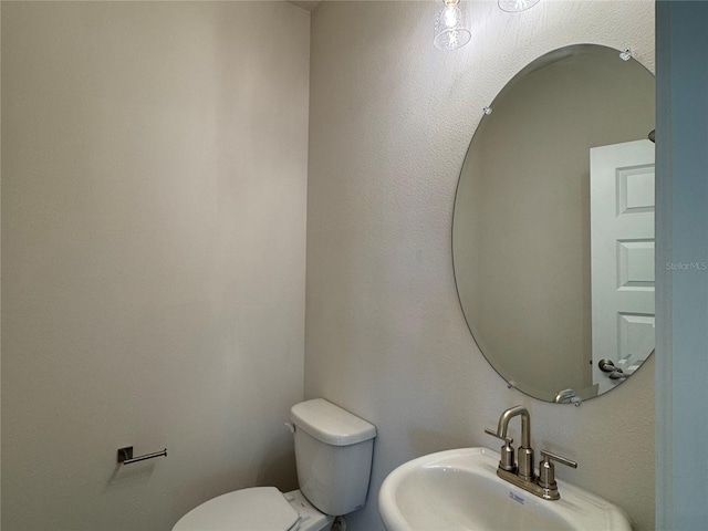 4113 Sagefield Dr, Harmony, FL 34773 - bathroom featuring a sink and toilet