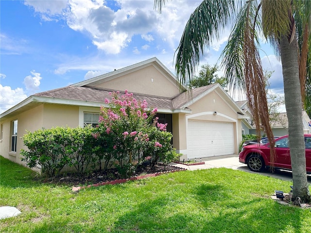 603 Reston Pl, Davenport, FL 33897 - view of front of property featuring stucco siding, a garage, a front yard, and driveway