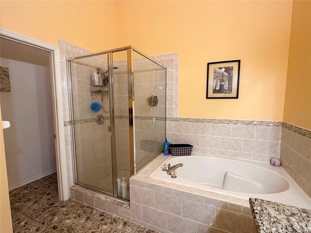 603 Reston Pl, Davenport, FL 33897 - bathroom with a garden tub and a stall shower