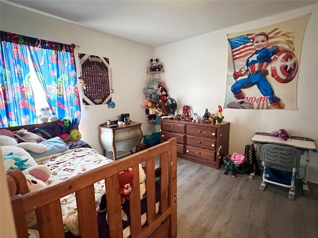 603 Reston Pl, Davenport, FL 33897 - bedroom with wood finished floors