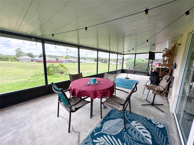603 Reston Pl, Davenport, FL 33897 - sunroom with outdoor dining space