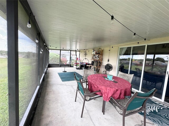 603 Reston Pl, Davenport, FL 33897 - sunroom with outdoor dining space