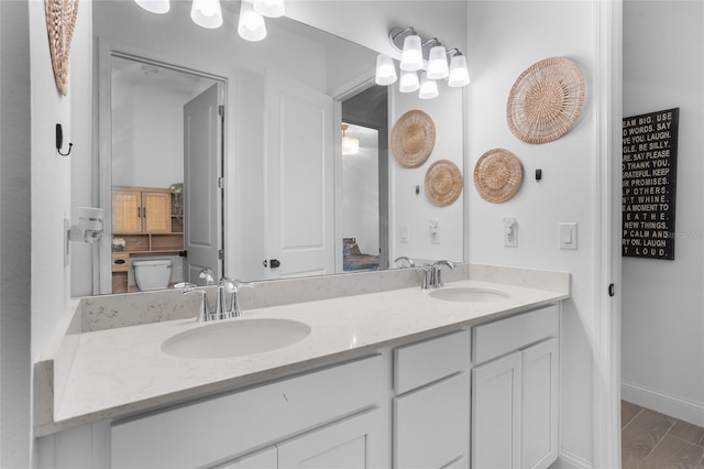 2149 Raglan Cir, Ormond Beach, FL 32174 - bathroom with double vanity and toilet
