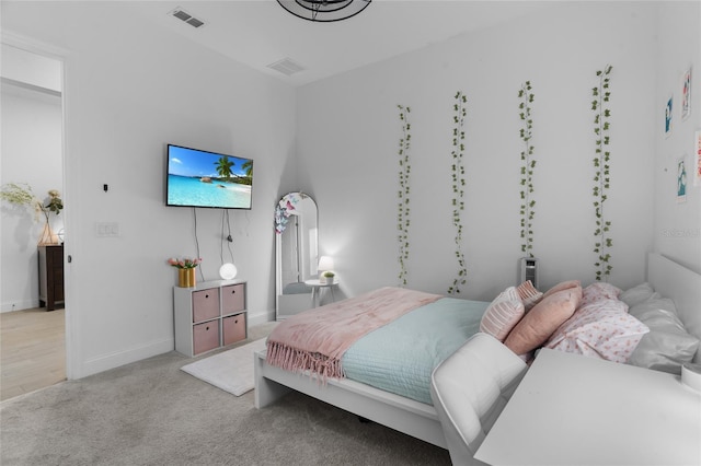 2149 Raglan Cir, Ormond Beach, FL 32174 - bedroom featuring light carpet and baseboards