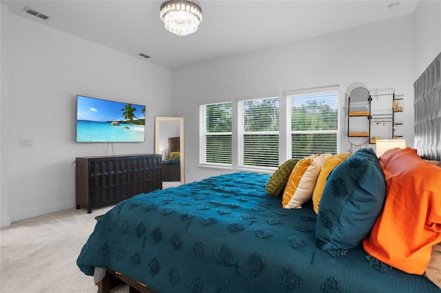 2149 Raglan Cir, Ormond Beach, FL 32174 - bedroom featuring carpet and a chandelier