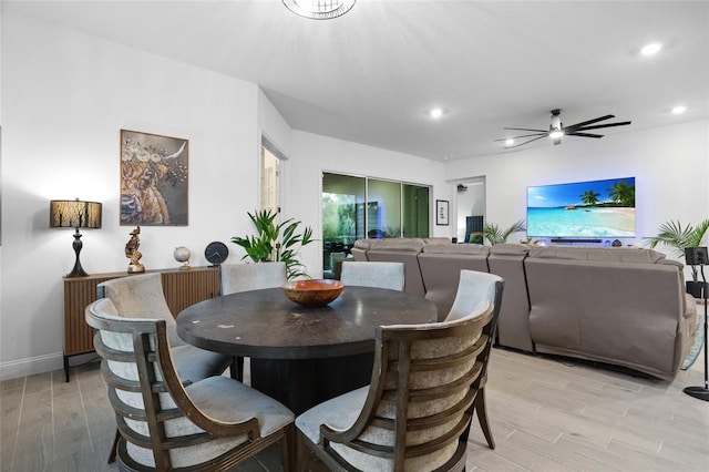 2149 Raglan Cir, Ormond Beach, FL 32174 - dining space featuring light wood-style flooring, ceiling fan, and recessed lighting