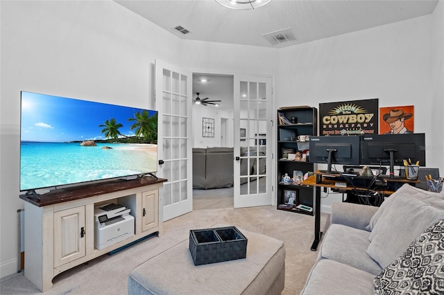 2149 Raglan Cir, Ormond Beach, FL 32174 - living area featuring french doors, an office area, and light carpet