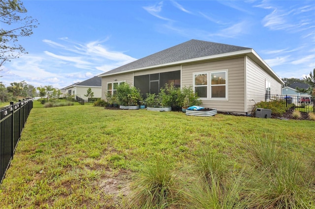 2149 Raglan Cir, Ormond Beach, FL 32174 - rear view of property with a sunroom