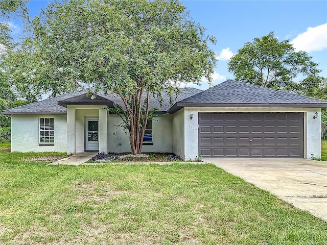 14939 SW 46th Cir, Ocala, FL 34473 - single story home with stucco siding, a garage, a front lawn, concrete driveway, and roof with shingles
