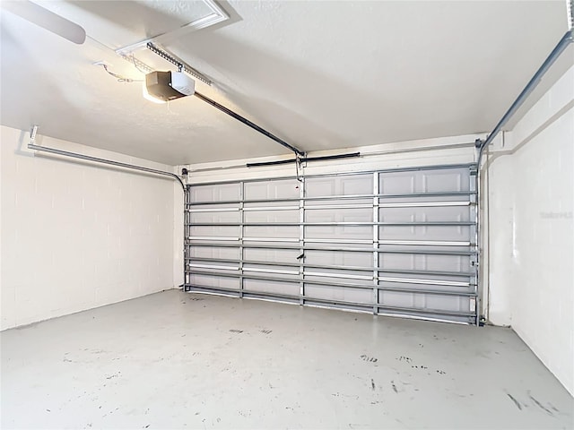 14939 SW 46th Cir, Ocala, FL 34473 - garage with a garage door opener and concrete block wall