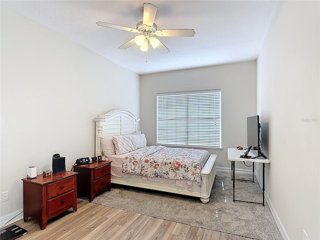 2460 The Oaks Blvd, Kissimmee, FL 34746 - bedroom featuring light wood-style flooring and ceiling fan