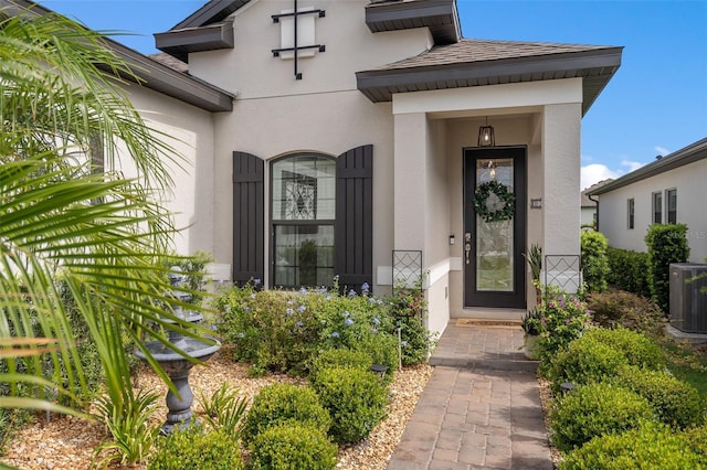 2338 Clemblue Rd, Clermont, FL 34715 - doorway to property featuring stucco siding