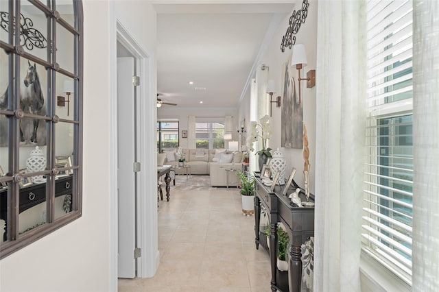 2338 Clemblue Rd, Clermont, FL 34715 - hallway with light tile patterned floors and ornamental molding