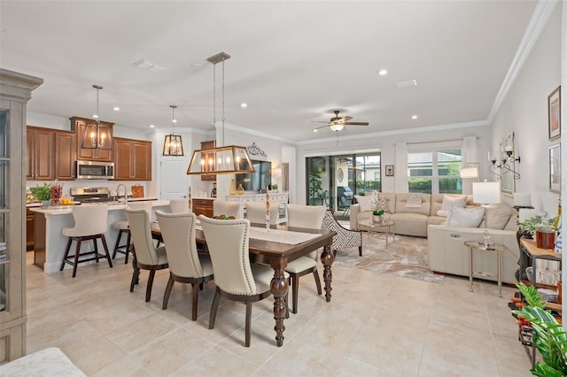 2338 Clemblue Rd, Clermont, FL 34715 - dining room with crown molding, recessed lighting, a ceiling fan, and light tile patterned floors