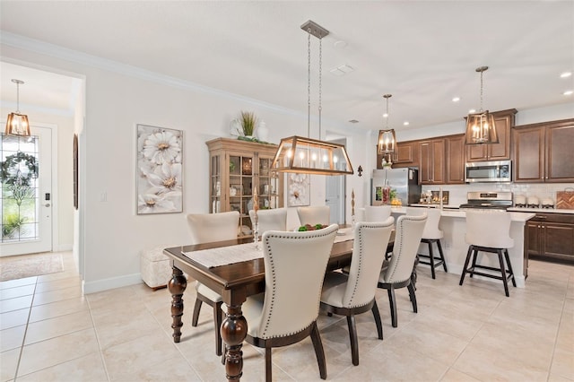 2338 Clemblue Rd, Clermont, FL 34715 - dining space featuring light tile patterned flooring, recessed lighting, and ornamental molding