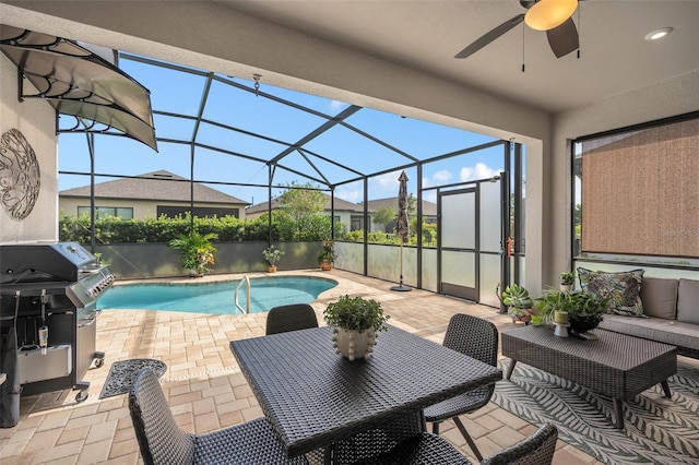 2338 Clemblue Rd, Clermont, FL 34715 - view of swimming pool with a patio, ceiling fan, glass enclosure, a grill, and an outdoor living space