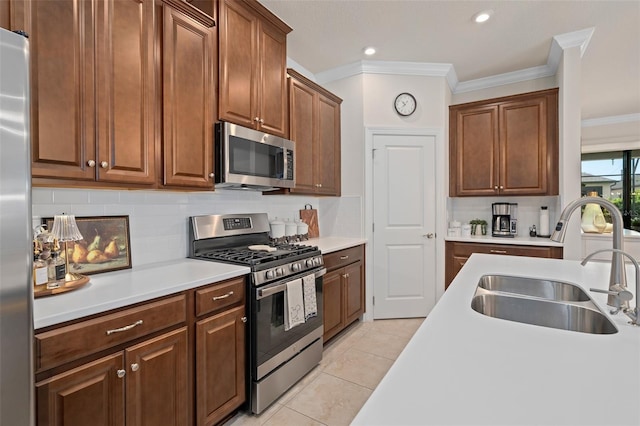 2338 Clemblue Rd, Clermont, FL 34715 - kitchen with stainless steel appliances, crown molding, tasteful backsplash, light countertops, and light tile patterned floors