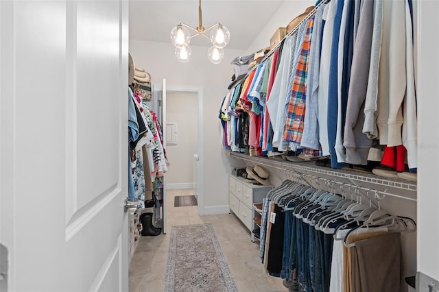 2338 Clemblue Rd, Clermont, FL 34715 - spacious closet with light tile patterned floors and a chandelier
