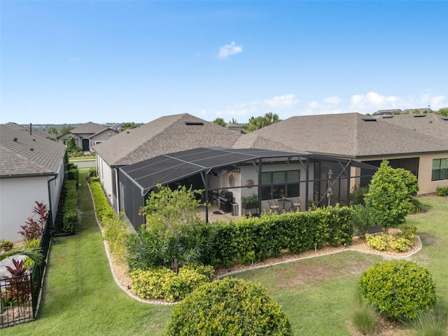 2338 Clemblue Rd, Clermont, FL 34715 - back of property with a shingled roof and a lanai