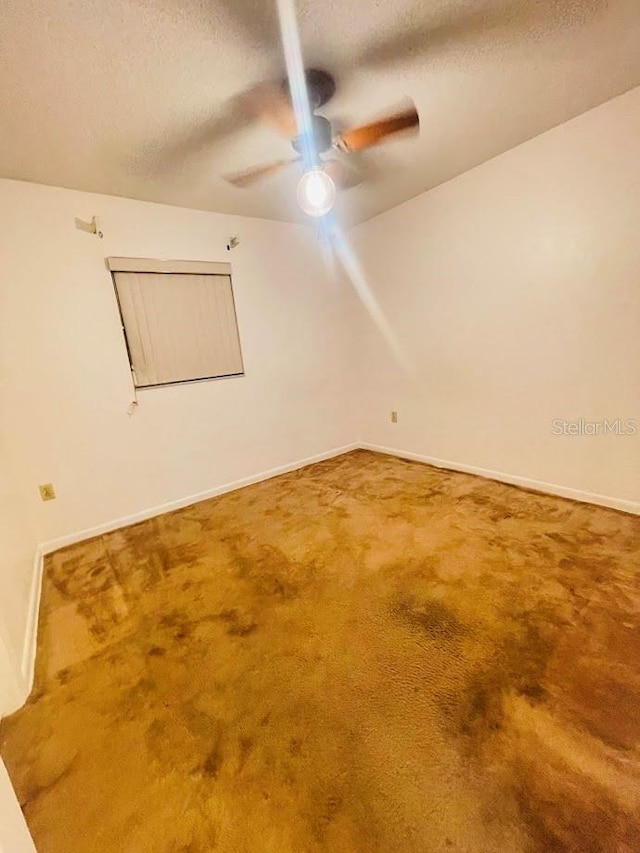 1980 Williams Manor Ave, Orlando, FL 32811 - spare room with ceiling fan, carpet floors, and a textured ceiling