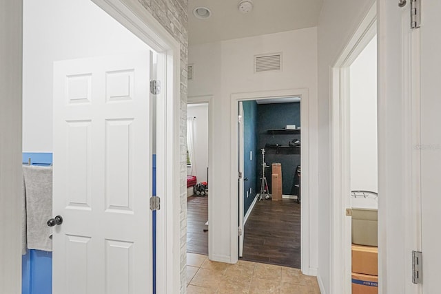2647 Running Oak Ct, North Port, FL 34289 - hall with baseboards and light tile patterned flooring