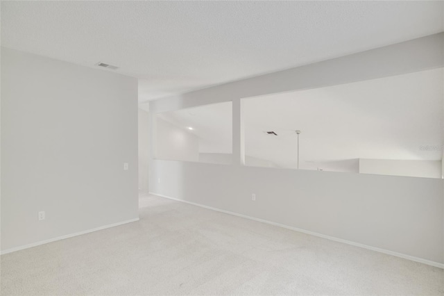 2262 Stonehedge Loop, Kissimmee, FL 34743 - carpeted empty room featuring baseboards