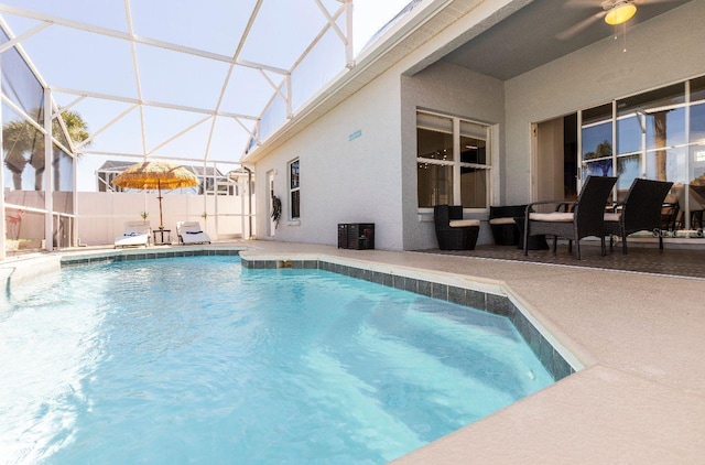 1041 Jaybee Ave, Davenport, FL 33897 - view of swimming pool featuring a patio area, a ceiling fan, and a lanai