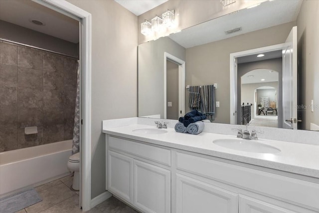 15264 Shonan Gold Dr, Winter Garden, FL 34787 - full bathroom with double vanity, shower / tub combo with curtain, and tile patterned flooring