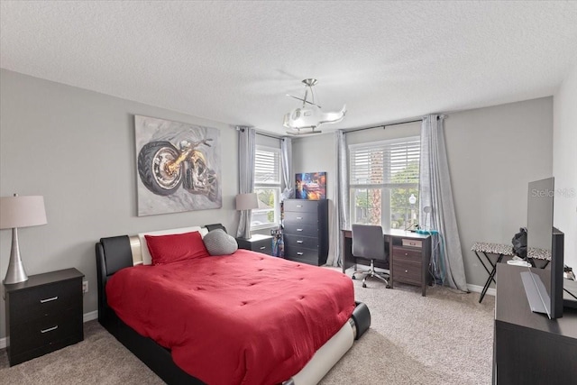 15264 Shonan Gold Dr, Winter Garden, FL 34787 - carpeted bedroom with a textured ceiling and a desk