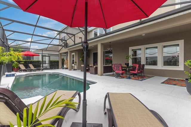 15264 Shonan Gold Dr, Winter Garden, FL 34787 - swimming pool featuring a patio, a lanai, and outdoor dining space