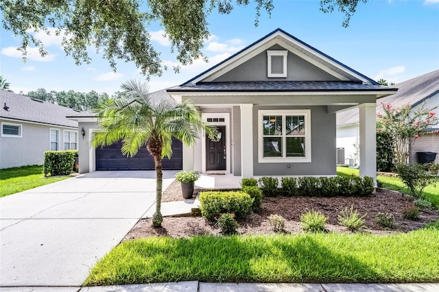 6539 Chagford Ln, Windermere, FL 34786 - single story home with stucco siding, an attached garage, driveway, and covered porch