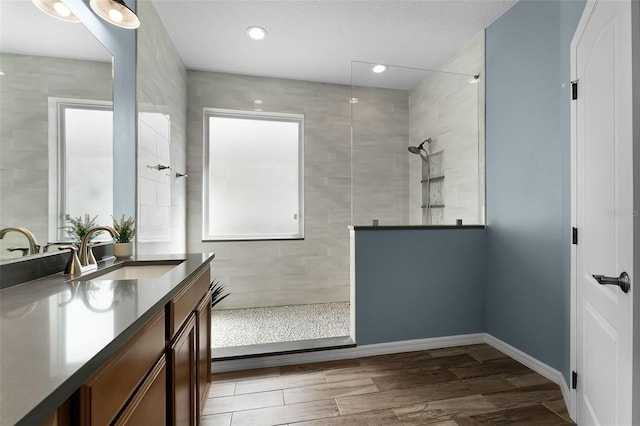 6539 Chagford Ln, Windermere, FL 34786 - bathroom featuring vanity, plenty of natural light, and a walk in shower