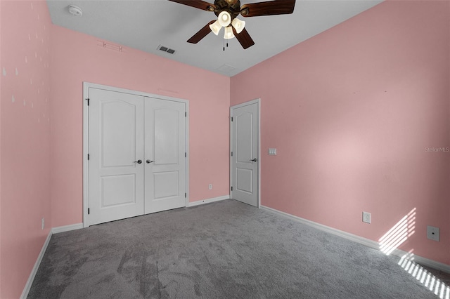 6539 Chagford Ln, Windermere, FL 34786 - unfurnished bedroom with carpet, a closet, and a ceiling fan