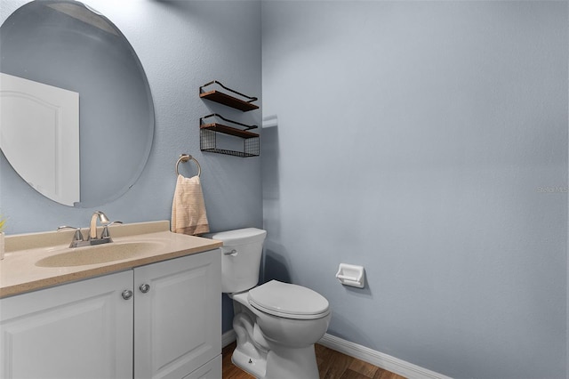6539 Chagford Ln, Windermere, FL 34786 - half bathroom with wood finished floors and vanity